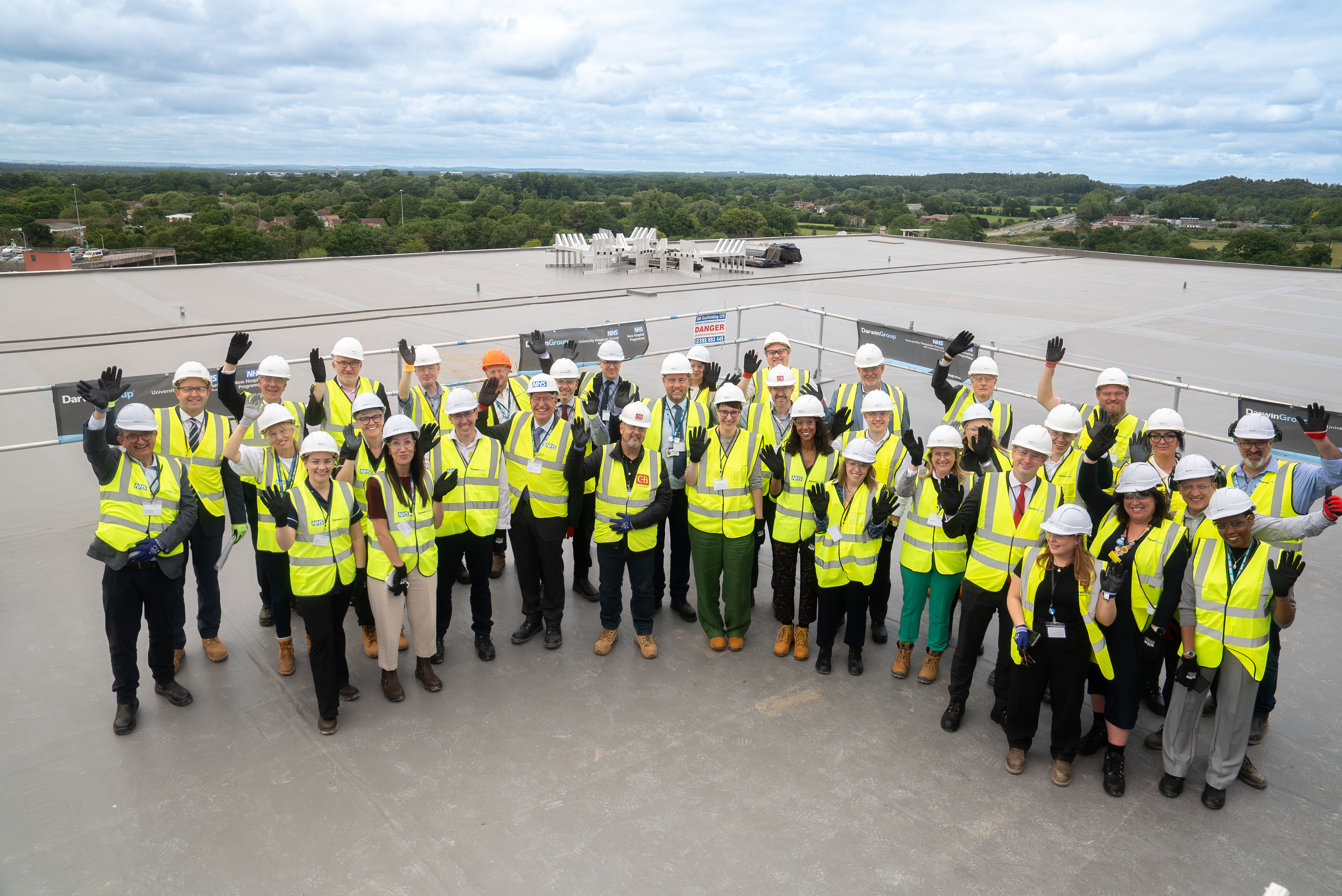 coast building topping out 10 june group shot