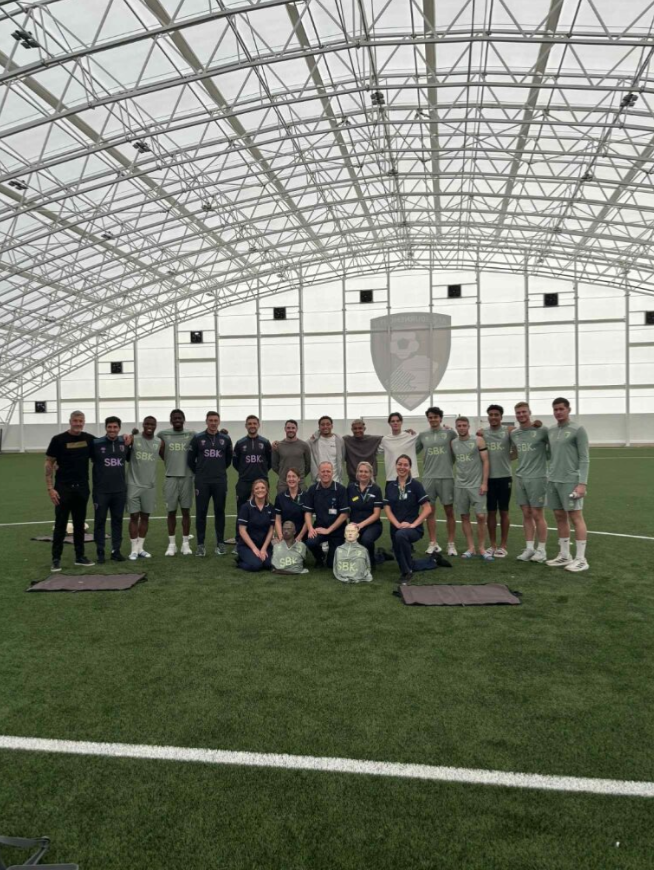 University Hospitals Dorset teaches footballers vital CPR skills