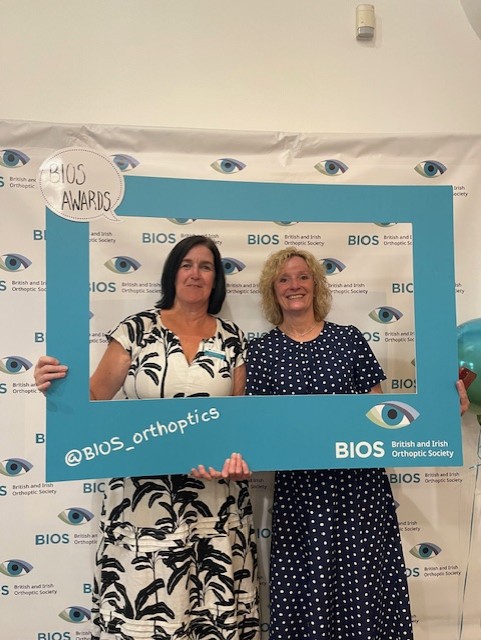 julie and colleague bios award ceremony