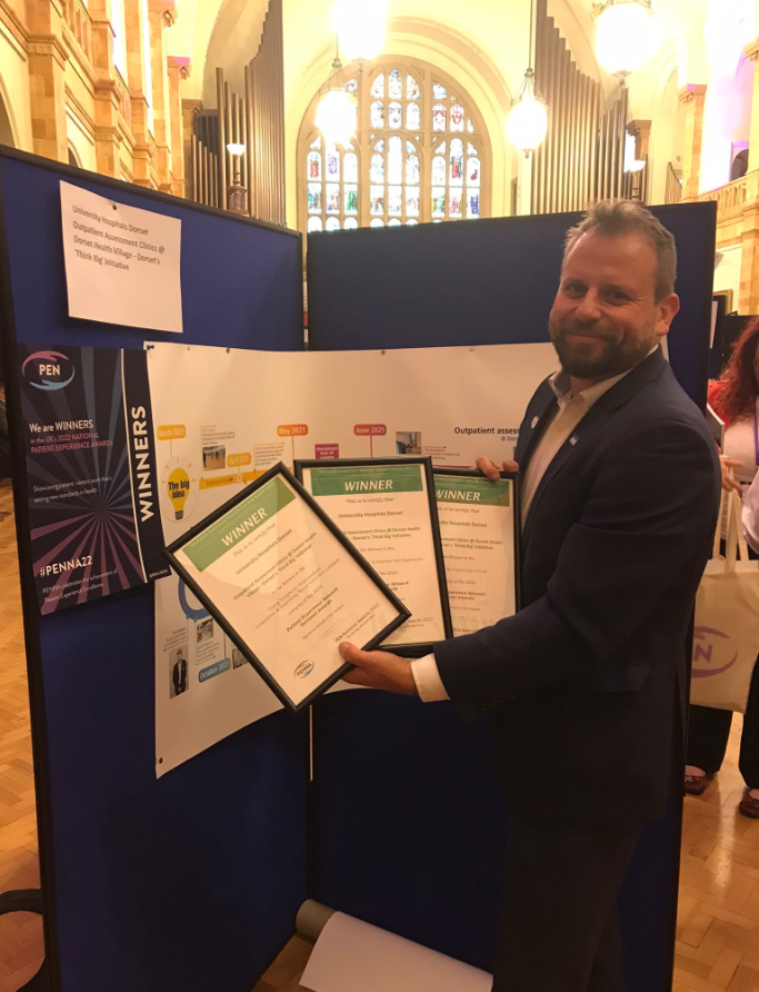 jon wright with award certificates