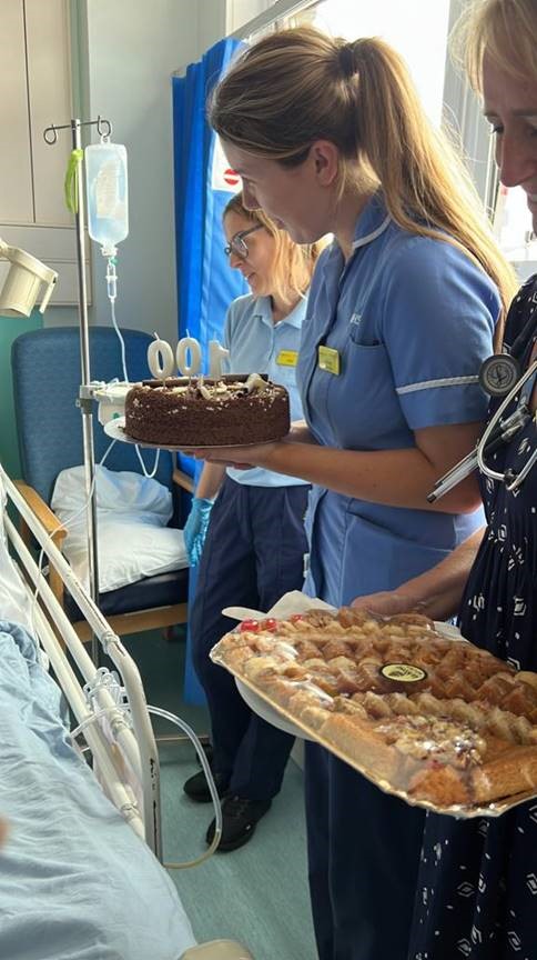 Ward staff with cake